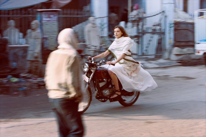 Daria on Motorcycle in Varanasi, 2012  Archival pigment print  30 x 40 inches  Edition number 1 of 10